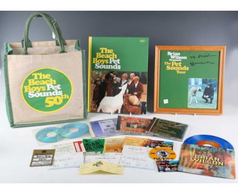 A four-CD box set, 'The Beach Boys, Pet Sounds', together with a tour poster, signed by Brian Wilson, and various other Beach