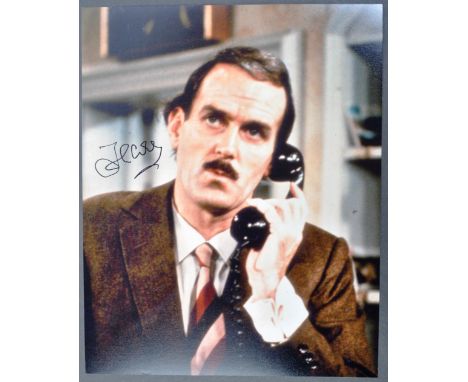 John Cleese - English Writer & Actor - autographed colour 8x10" photograph of him as the iconic Basil Fawlty in Fawlty Towers