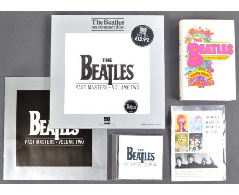 The Beatles - a collection of Beatles related items to include; a Limited Edition ' The Beatles - Past Masters Volume 2 ' CD 