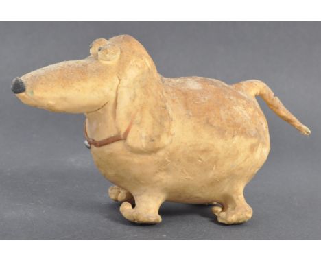 Aardman Animations - Unknown Production - a production used plasticine animation puppet of a dog. The dog of typical early-Aa