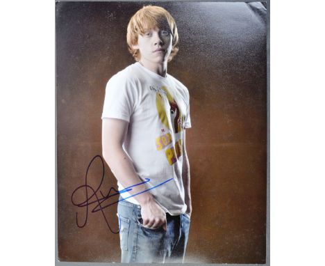 Rupert Grint - Harry Potter - autographed 8x10" signed photograph of Grint. Signed by the actor in blue ink to a light portio