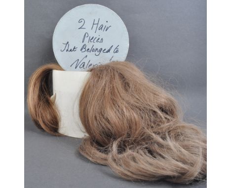 From the collection of Valerie Leon - x2 personally owned and worn wig hair pieces. The ponytail style hair pieces both of li