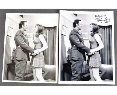 From the collection of Valerie Leon - two 8x10 black and white press photographs of Ms Leon and Jack Douglas filming a sketch