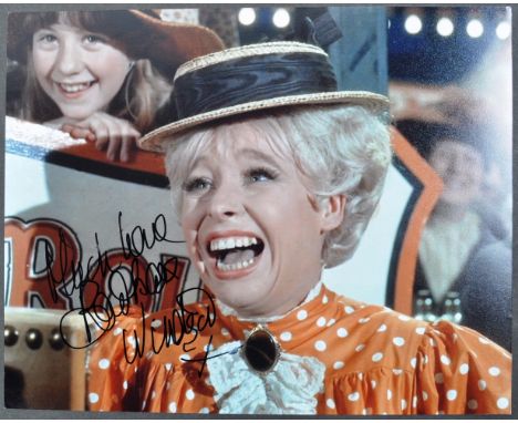 Carry On Films - Barbara Windsor (1937-2020) - an autographed 8x10" colour photograph of Windsor in the Carry On franchise. S