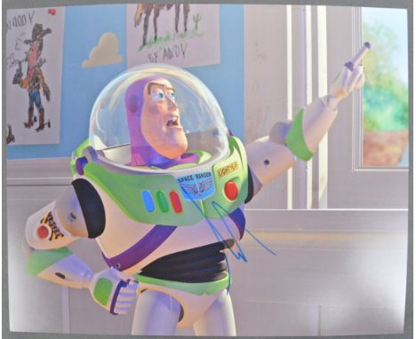 Tim Allen - American Actor - Toy Story - great 11x14" colour photograph of Buzz Lightyear from the franchise. Signed in blue 