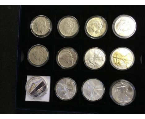 COINS : USA Silver Dollar collection in display case, with 1889 and 1886 Morgan Dollars from Philadelphia Mint in fine condit