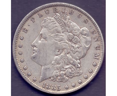 COINS: 1885 USA Morgan Silver Dollar in good to fine condition 