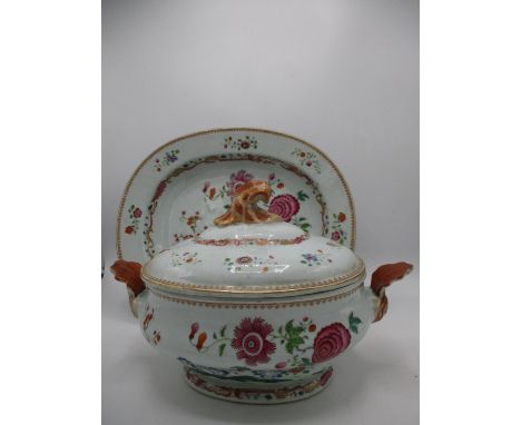 A late 18th century Chinese tureen and cover and a matching meat plate decorated with blossoming branches, peonies, rocks, an