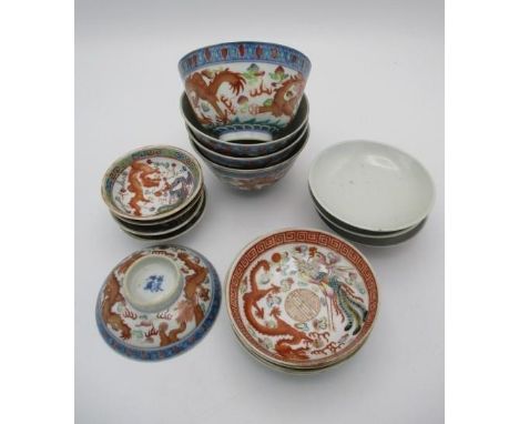 20th century Chinese ceramics comprising of four bowls 4 1/4"dia and three sets of four dishes, each decorated with dragons i