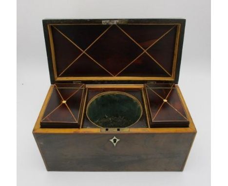 A George III boxwood and ebony string, inlaid exotic hardwood tea caddy with a silver plated ring handle to the hinged lid, e