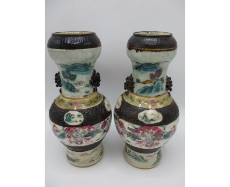 A pair of 19th century Chinese Nankin crackle glazed famille rose vases of bulbous form, decorated with warrior scenes and la