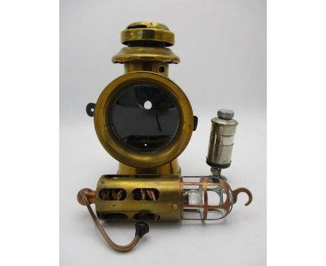 An early 20th century Howes &amp; Burley brass car side lamp A/F, a brass and copper inspection lamp and an aircraft cockpit 