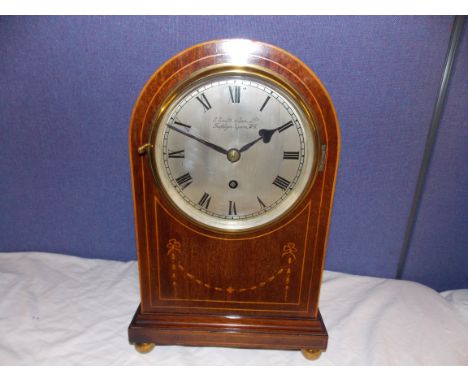 MAHOGANY AND BOX LINE INLAID DOMED CASED FUSSEE MANTLE CLOCK BY S SMITH AND SONS LTD, TRAFALGAR SQUARE W6.