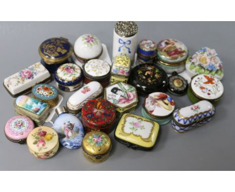 A collection of decorative porcelain and enamel patch boxes, etc., including a Bilston 'Swansea' example, a cylindrical scent