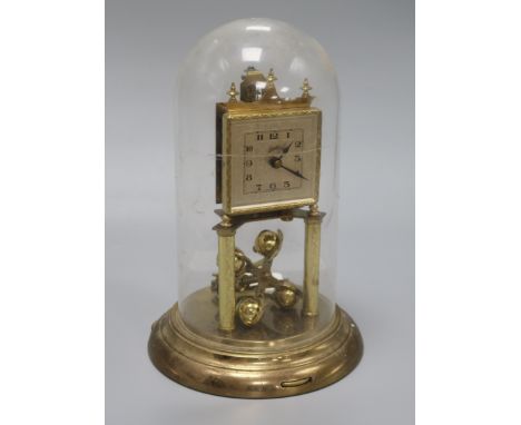 A gilt brass torsion clock under dome height 31cm