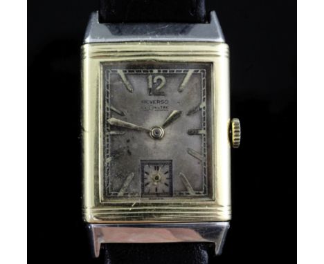 A 1930's 18ct gold and stainless steel Le Coultre Reverso manual wind wrist watch, the rectangular dial with baton numerals a