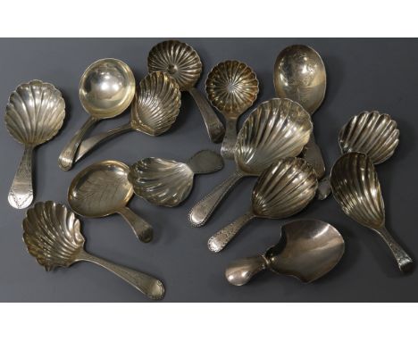 Fourteen assorted mainly early 19th century silver caddy spoons, various dates, patterns and makers.