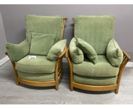 Pair of ERCOL model 1067 armchairs, blonde frames with green fabric cushions, H95cm x W88CM x D65cm