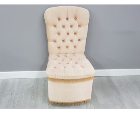 Vintage button back and seated fringed chair