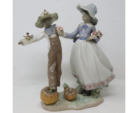 Lladro figural group, Scarecrow and The Lady 5385, very minor losses to petals, H: 25 cm. UK P&amp;P Group 3 (£30+VAT for the