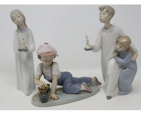 Three Lladro figurines, including All Aboard 7619, no chips or cracks, largest H: 20 cm. UK P&amp;P Group 3 (£30+VAT for the 