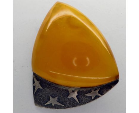 875 Russian oxidised silver brooch, mounted with a large panel of butterscotch amber, L: 50 mm. UK P&amp;P Group 0 (£6+VAT fo