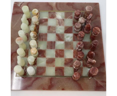 Carved onyx chess set, king H: 50 mm, board 27 x 27 cm, no visible damages, UK P&amp;P Group 2 (£20+VAT for the first lot and