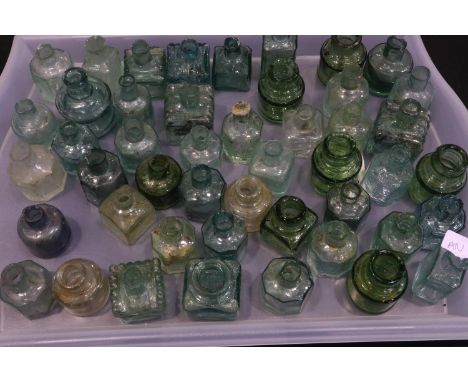 Collection of Victorian green glass ink bottles and wells (50). UK P&amp;P Group 3 (£30+VAT for the first lot and £8+VAT for 