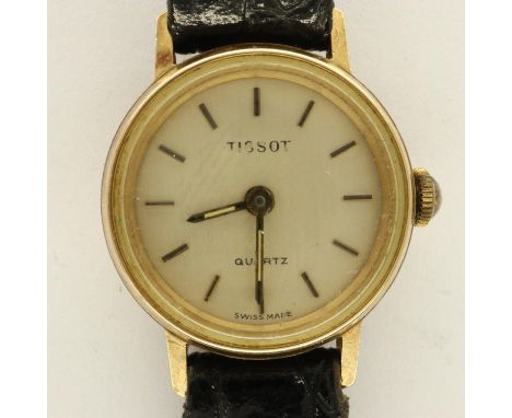 TISSOT: 9ct gold cased ladies quartz wristwatch on a black leather strap, requires battery. UK P&amp;P Group 1 (£16+VAT for t