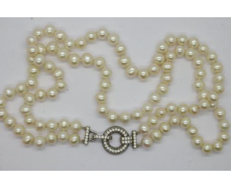Double row of cultured pearl with 925 silver and cubic zirconia claps, boxed, L: 48 cm. UK P&amp;P Group 1 (£16+VAT for the f