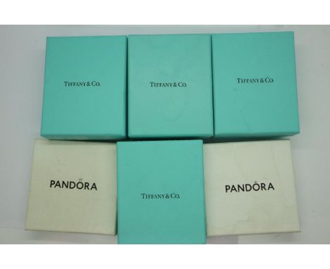 Four original Tiffany boxes with bag inserts and two Pandora boxes. UK P&amp;P Group 1 (£16+VAT for the first lot and £2+VAT 