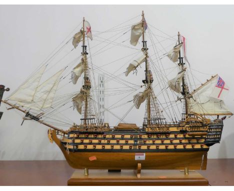 A wooden model of HMS Victory, on stand, height 56cm