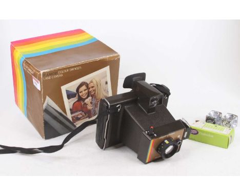 A boxed Polaroid colour Swinger land camera