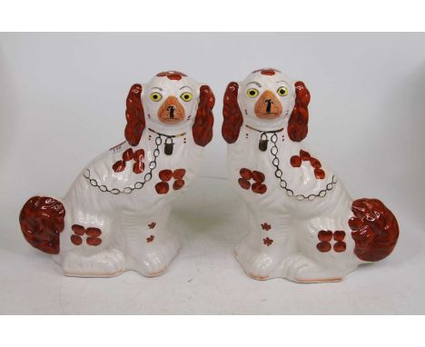 A pair of Arthur Wood pottery models of spaniels, each h.29cm 