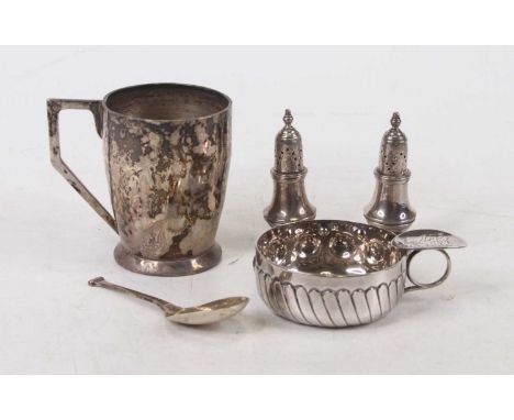 A French silver plated tastevin together with an English silver christening mug, and pair of silver pepperettes, and caddy sp