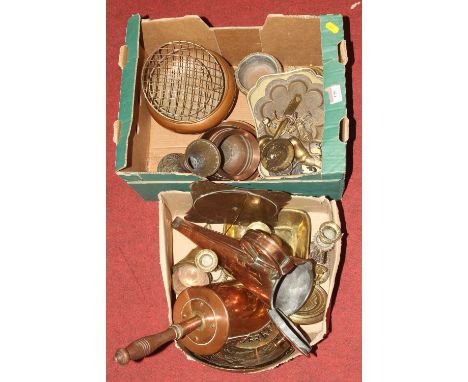 Two boxes of mixed metalware to include a Victorian brass chamberstick, brass desk calendar, inkwell etc 
