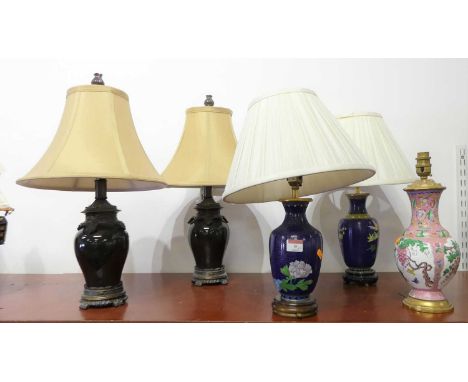 A pair of Chinese cloisonne enamel table lamps and shades of baluster shape, each mounted to a turned wooden base, height inc