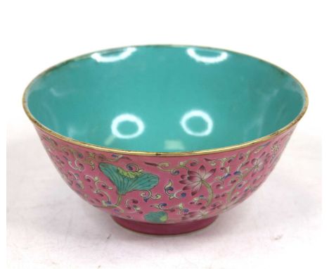 A Chinese porcelain bowl, enamel decorated with flowers, dia. 16.5cm