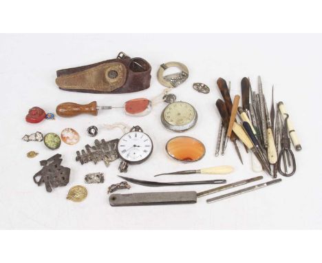 A collection of miscellaneous items to include a military gauge inscribed Hallmaster 124-1046, with War Department broad arro
