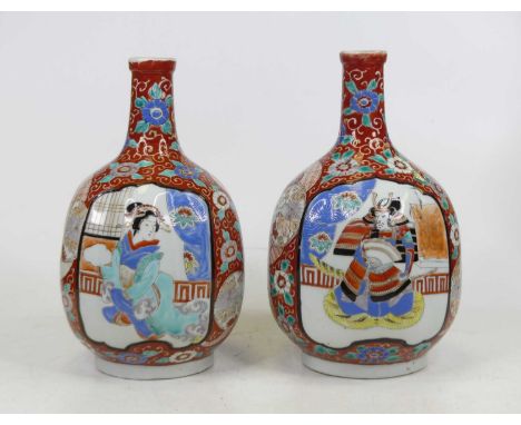 A pair of Japanese porcelain vases, each having a slender neck above a bulbous body, enamel decorated with Samurai within a c