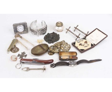 A collection of miscellaneous items to include cased dress studs, nickel cheroot holder, brass pocket snuff box, silver clad 