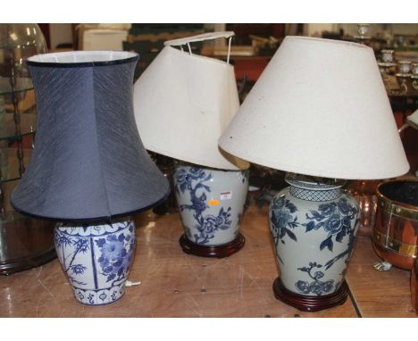 A pair of modern Chinese blue and white ginger jars, each converted to a table lamp, h.41cm (including fittings); together wi