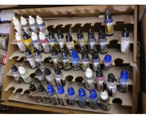 Two boxes of model paint, to include Tamiya, many appear used