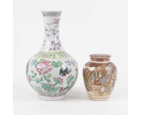 A Chinese export vase having a flared rim to a slender neck and bulbous lower body, enamel decorated with various birds and f