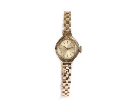Audax 9 carat gold cased ladies wristwatch, the signed dial with gilt batons, manual wound, the case 15mm diameter, on a 9 ca