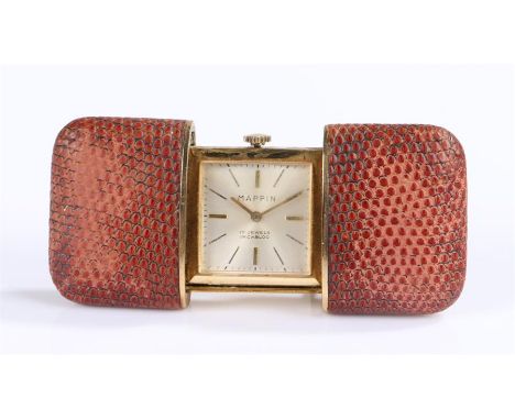 Mappin travel clock, the red leather exterior sliding open to reveal a gilt interior case with folding rear support, the sign