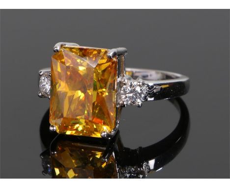 18 carat white gold sphalerite and diamond set ring, the head with a rectangular cut sphalerite with a round cut diamond to e