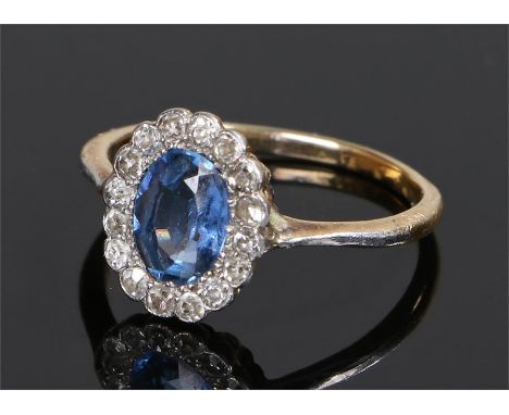 Early 20th Century Sapphire and diamond ring, the central oval sapphire with a diamond surround, ring size K