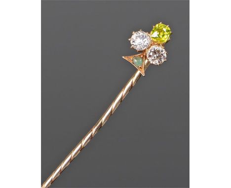 Diamond and aquamarine stick pin, with a fancy yellow diamond above two diamonds and an aquamarine, the head 7mm diameter 