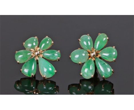Pair of jade set earrings, each in the form of a flower, 15mm diameter 